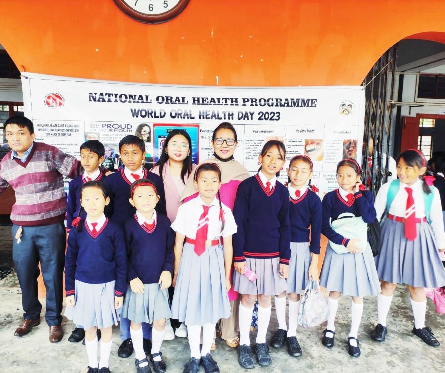 Doctors with students of St Anthony’s School , Tenyiphe-I village during the World Oral Health Day programme on March 20.